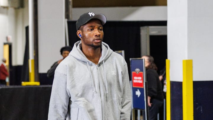 Mar 28, 2025; New Orleans, Louisiana, USA;  Golden State Warriors forward Jonathan Kuminga (00) arrives at the arena before the game against  the New Orleans Pelicans at Smoothie King Center. Mandatory Credit: Stephen Lew-Imagn Images