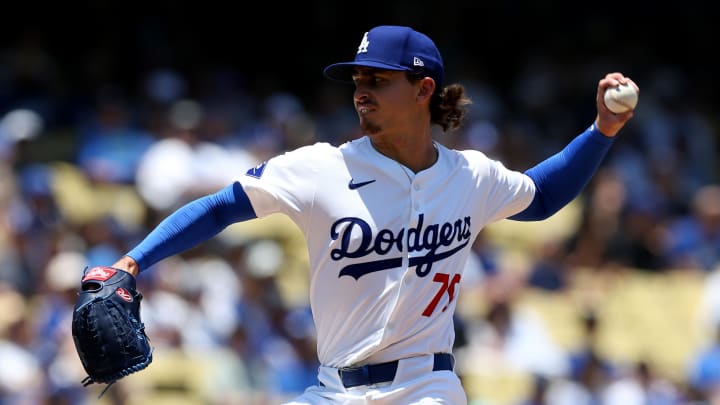 Jul 7, 2024; Los Angeles, California, USA; Los Angeles Dodgers pitcher Justin Wrobleski (70) throws in his major league debut during the first inning against the Milwaukee Brewers at Dodger Stadium. Mandatory Credit: Jason Parkhurst-USA TODAY Sports Jul 7, 2024; Los Angeles, California, USA; Los Angeles Dodgers pitcher Justin Wrobleski (70) throws in his major league debut during the first inning against the Milwaukee Brewers at Dodger Stadium. Mandatory Credit: Jason Parkhurst-USA TODAY Sports
