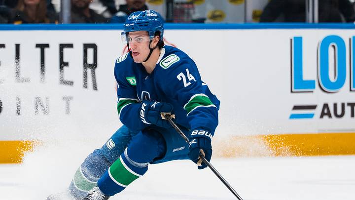 Apr 14, 2026; Vancouver, British Columbia, CAN; Vancouver Canucks defenseman Zeev Buium (24) handles the puck against the Los Angeles Kings in the second period at Rogers Arena. Mandatory Credit: Bob Frid-Imagn Images
