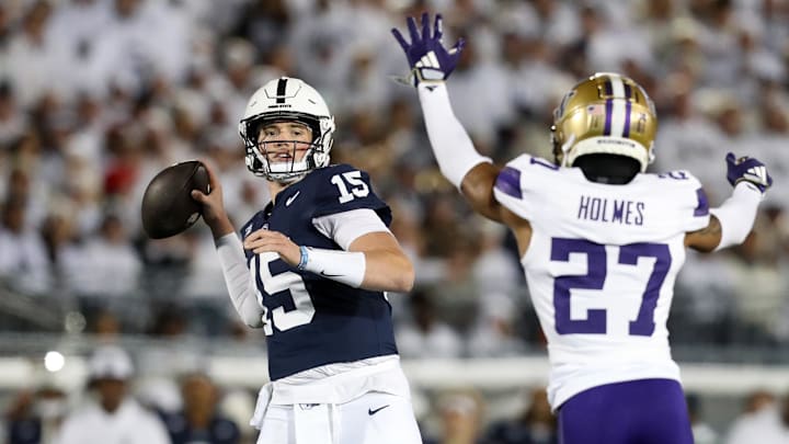 Penn State quarterback Drew Allar throws a pass against the Washington Huskies at Beaver Stadium. Penn State quarterback Drew Allar throws a pass against the Washington Huskies at Beaver Stadium.