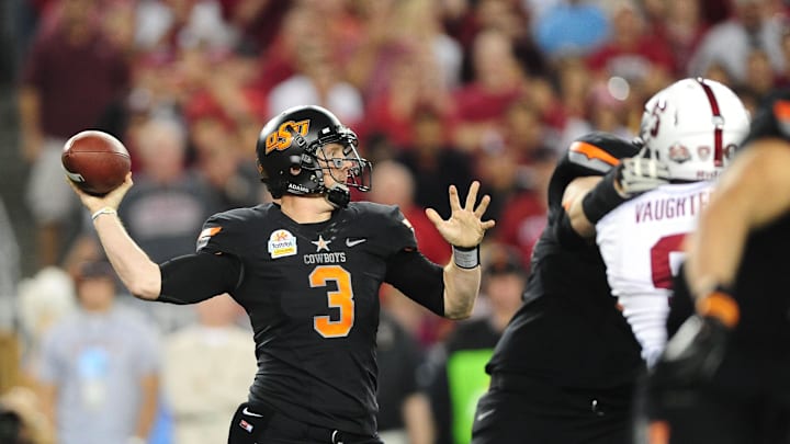 Jan 2, 2012; Glendale, AZ, USA; Oklahoma State Cowboys quarterback (3) Brandon Weeden throws a pass in the second quarter against the Stanford Cardinal in the 2012 Fiesta Bowl at University of Phoenix Stadium. Mandatory Credit: Mark J. Rebilas-Imagn Images Jan 2, 2012; Glendale, AZ, USA; Oklahoma State Cowboys quarterback (3) Brandon Weeden throws a pass in the second quarter against the Stanford Cardinal in the 2012 Fiesta Bowl at University of Phoenix Stadium. Mandatory Credit: Mark J. Rebilas-Imagn Images
