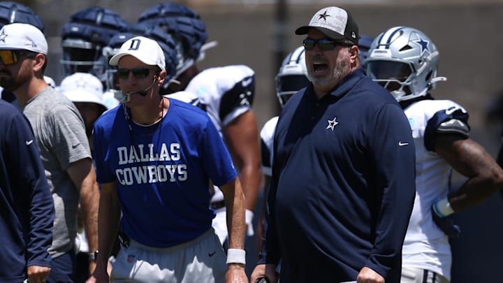 Jul 30, 2024; Oxnard, CA, USA; Dallas Cowboys special teams coordinator John Fassel and head coach Mike McCarthy during training camp at the River Ridge Playing Fields in Oxnard, California. Mandatory Credit: Jason Parkhurst-USA TODAY Sports