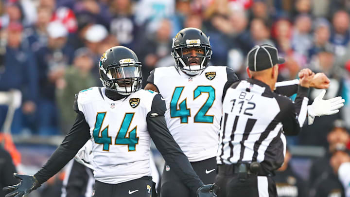 Jan 21, 2018; Foxborough, MA, USA; Jacksonville Jaguars linebacker Myles Jack (44) and safety Barry Church (42) react to a unnecessary roughness penalty against the New England Patriots in the AFC Championship Game at Gillette Stadium. Mandatory Credit: Mark J. Rebilas-Imagn Images