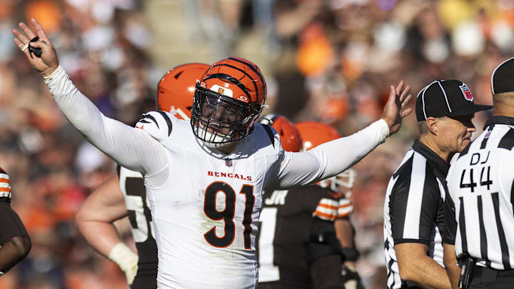 Oct 20, 2024; Cleveland, Ohio, USA; Cincinnati Bengals defensive end Trey Hendrickson (91) reacts following penalty flags being thrown during the fourth quarter against the Cleveland Browns at Huntington Bank Field. The penalties were against the Browns. Mandatory Credit: Scott Galvin-Imagn Images