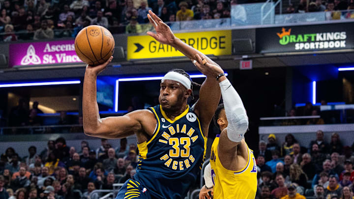 Feb 2, 2023; Indianapolis, Indiana, USA; Indiana Pacers center Myles Turner (33) rebounds while Los Angeles Lakers guard Russell Westbrook (0) defends in the second half at Gainbridge Fieldhouse. Mandatory Credit: Trevor Ruszkowski-Imagn Images