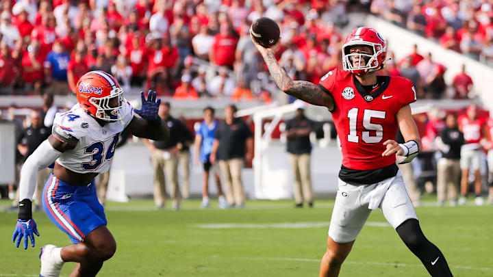 Florida Gators edge George Gumbs Jr. (34) pressures Georgia Bulldogs quarterback Carson Beck (15) during the first half at EverBank Stadium in Jacksonville, FL on Saturday, November 2, 2024. [Doug Engle/Gainesville Sun]