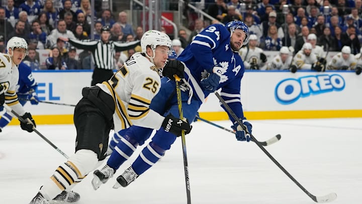Apr 24, 2024; Toronto, Ontario, CAN; Boston Bruins defenseman Brandon Carlo (25) checks Toronto