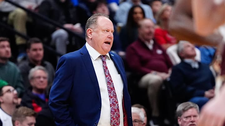 Mar 20, 2025; Denver, CO, USA; Wisconsin Badgers head coach Greg Gard looks on during the first half against the Montana Grizzlies in the first round of the NCAA Tournament at Ball Arena. Mandatory Credit: Ron Chenoy-Imagn Images