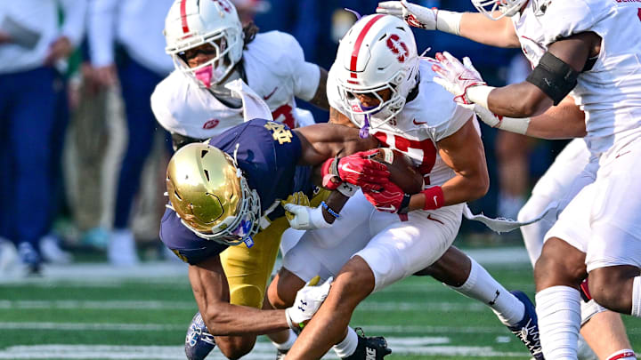 Oct 12, 2024; South Bend, Indiana, USA; Stanford Cardinal cornerback Jshawn Frausto-Ramos (17) strips the ball from Notre Dame Fighting Irish wide receiver Beaux Collins (5) in the second quarter at Notre Dame Stadium. Mandatory Credit: Matt Cashore-Imagn Images