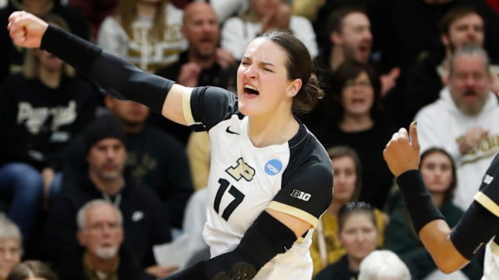 Purdue Boilermakers outside hitter Eva Hudson (17) and Purdue Boilermakers middle blocker Raven Colvin (7) celebrate Thursday, Dec. 5, 2024, during the NCAA Women’s Volleyball Tournament match against the Western Michigan Broncos at Holloway Gymnasium in West Lafayette, Ind.