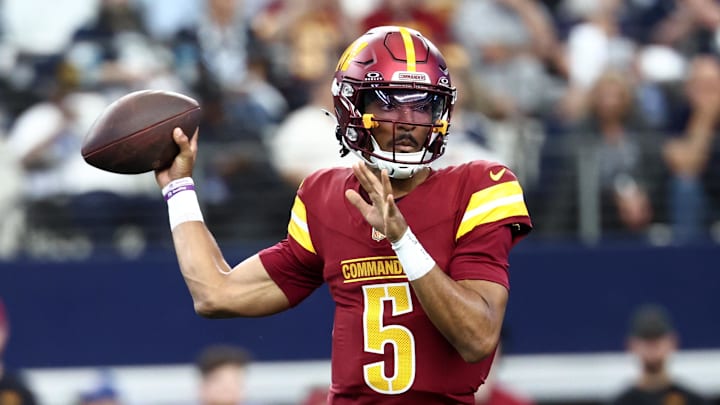Oct 19, 2025; Arlington, Texas, USA; Washington Commanders quarterback Jayden Daniels (5) passes the ball against the Dallas Cowboys during the first quarter of the game at AT&T Stadium. Mandatory Credit: Kevin Jairaj-Imagn Images Oct 19, 2025; Arlington, Texas, USA; Washington Commanders quarterback Jayden Daniels (5) passes the ball against the Dallas Cowboys during the first quarter of the game at AT&T Stadium. Mandatory Credit: Kevin Jairaj-Imagn Images