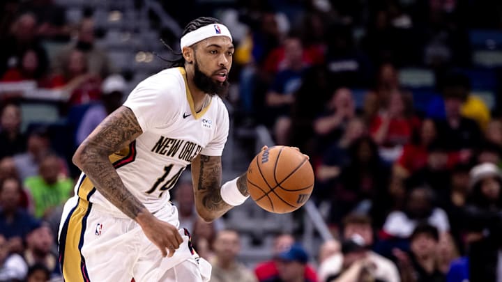 Nov 11, 2024; New Orleans, Louisiana, USA;  New Orleans Pelicans forward Brandon Ingram (14) brings the ball up court against the Brooklyn Nets during the second half at Smoothie King Center. Mandatory Credit: Stephen Lew-Imagn Images