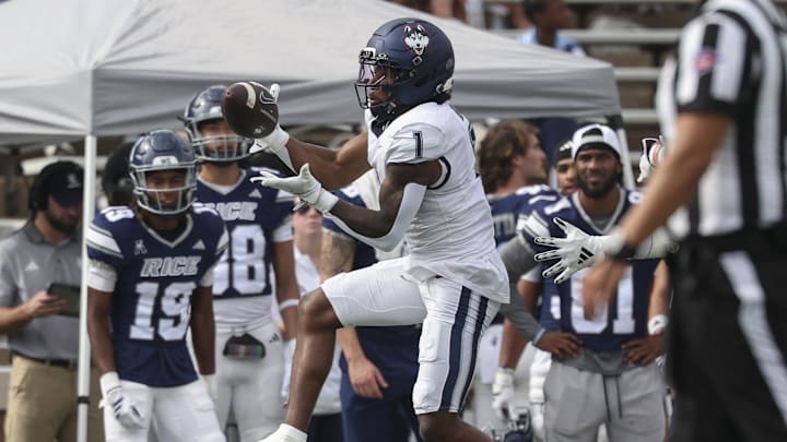 Oct 25, 2025; Houston, Texas, USA; UConn Huskies wide receiver Skyler Bell (1) makes a reception during the second quarter against the Rice Owls at Rice Stadium. Oct 25, 2025; Houston, Texas, USA; UConn Huskies wide receiver Skyler Bell (1) makes a reception during the second quarter against the Rice Owls at Rice Stadium.