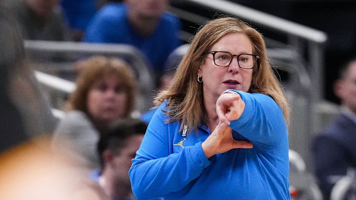 UCLA Bruins head coach Cori Close points up the court Sunday, March 8, 2026, during the Big Ten Tournament Championship game at Gainbridge Fieldhouse in Indianapolis. UCLA Bruins defeated the Iowa Hawkeyes, 96-45, for back to back Big Ten championships.