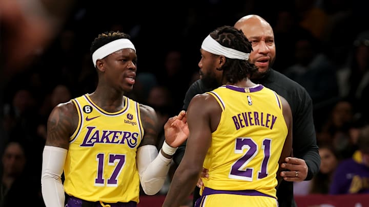 Jan 30, 2023; Brooklyn, New York, USA; Los Angeles Lakers guard Patrick Beverley (21) talks to guard Dennis Schroder (17) and Los Angeles Lakers head coach Darvin Ham after receiving a technical foul during the first quarter against the Brooklyn Nets at Barclays Center. Mandatory Credit: Brad Penner-Imagn Images