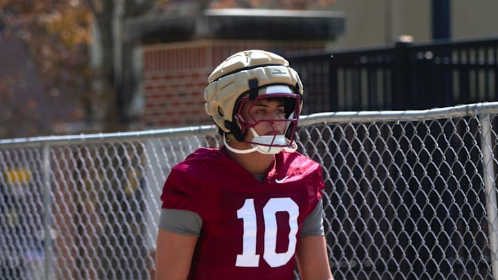 FSU football players walk into the first spring practice of the spring season on Wednesday, March 19, 2025