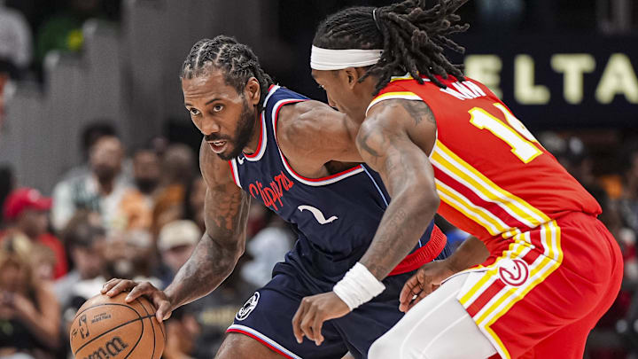 Mar 14, 2025; Atlanta, Georgia, USA; LA Clippers forward Kawhi Leonard (2) dribbles against Atlanta Hawks guard Terance Mann (14) during the second half at State Farm Arena. Mandatory Credit: Dale Zanine-Imagn Images Mar 14, 2025; Atlanta, Georgia, USA; LA Clippers forward Kawhi Leonard (2) dribbles against Atlanta Hawks guard Terance Mann (14) during the second half at State Farm Arena. Mandatory Credit: Dale Zanine-Imagn Images