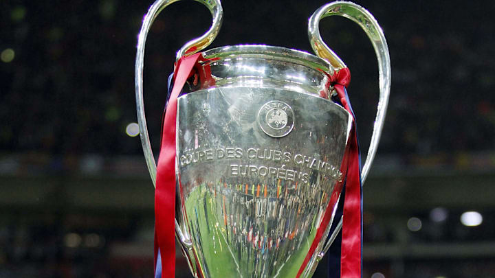 May 28, 2011; London, ENGLAND; FC Barcelona defenseman Gerard Pique celebrates with the championship trophy after defeating Manchester United 3-1 in the 2011 UEFA Champions League final at Wembley Stadium. Mandatory Credit: Walter Luger/GEPA via Imagn Images