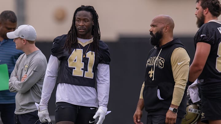 Jun 10, 2025; New Orleans, LA, USA;  New Orleans Saints running back coach Joel Thomas talks to running back Alvin Kamara (41) during minicamp at Ochsner Sports Performance Center. Mandatory Credit: Stephen Lew-Imagn Images