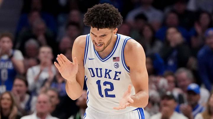 Mar 14, 2026; Charlotte, NC, USA; Duke Blue Devils forward Cameron Boozer (12) celebrates after a play against the Virginia Cavaliers during the men's ACC Conference Tournament Championship at Spectrum Center. Mandatory Credit: Bob Donnan-Imagn Images