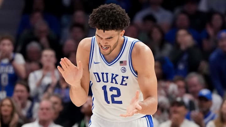 Mar 14, 2026; Charlotte, NC, USA; Duke Blue Devils forward Cameron Boozer (12) celebrates after a play against the Virginia Cavaliers during the men's ACC Championship.
