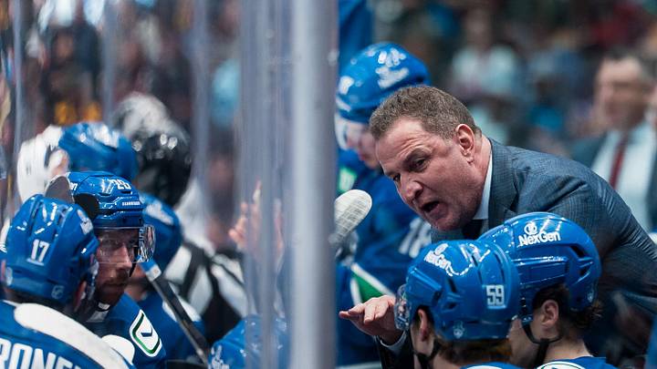 Apr 14, 2026; Vancouver, British Columbia, CAN; Vancouver Canucks head coach Adam Foote talks with defenseman Filip Hronek (17) and defenseman Marcus Pettersson (29) and defenseman Kirill Kudryavtsev (59) on the bench against the Los Angeles Kings in the third period at Rogers Arena. Mandatory Credit: Bob Frid-Imagn Images Apr 14, 2026; Vancouver, British Columbia, CAN; Vancouver Canucks head coach Adam Foote talks with defenseman Filip Hronek (17) and defenseman Marcus Pettersson (29) and defenseman Kirill Kudryavtsev (59) on the bench against the Los Angeles Kings in the third period at Rogers Arena. Mandatory Credit: Bob Frid-Imagn Images