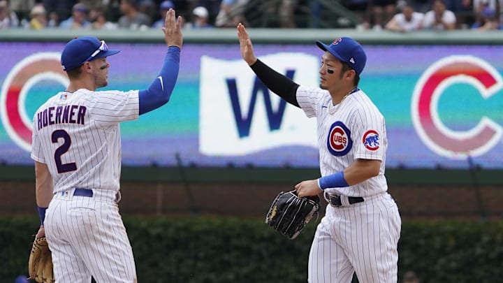 Jul 15, 2023; Chicago, Illinois, USA; Chicago Cubs right fielder Seiya Suzuki (27) and shortstop Nico Hoerner (2) celebrate their win against the Boston Red Sox at Wrigley Field. Mandatory Credit: David Banks-Imagn Images Jul 15, 2023; Chicago, Illinois, USA; Chicago Cubs right fielder Seiya Suzuki (27) and shortstop Nico Hoerner (2) celebrate their win against the Boston Red Sox at Wrigley Field. Mandatory Credit: David Banks-Imagn Images