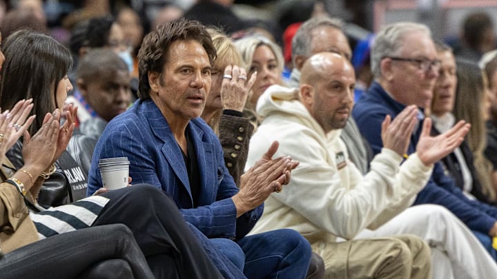 Mar 25, 2025; Detroit, Michigan, USA; The Detroit Pistons owner Tom Gores watches the game against the San Antonio Spurs during the first half at Little Caesars Arena. Mandatory Credit: David Reginek-Imagn Images