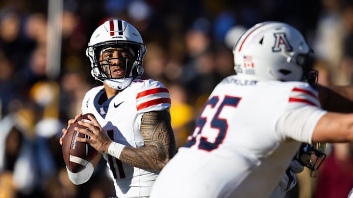 Nov 25, 2023; Tempe, Arizona, USA; Arizona Wildcats quarterback Noah Fifita (11) against the Arizona State Sun Devils in the first half of the Territorial Cup at Mountain America Stadium. Mandatory Credit: Mark J. Rebilas-Imagn Images