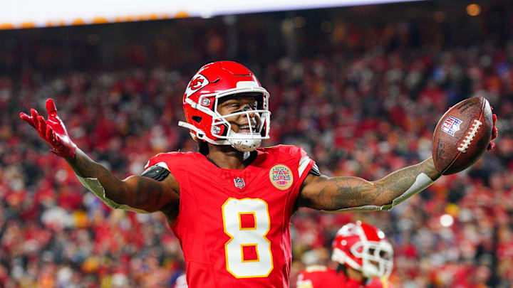 Dec 8, 2024; Kansas City, Missouri, USA; Kansas City Chiefs wide receiver DeAndre Hopkins (8) celebrates after scoring against the Los Angeles Chargers during the first half at GEHA Field at Arrowhead Stadium. Mandatory Credit: Denny Medley-Imagn Images