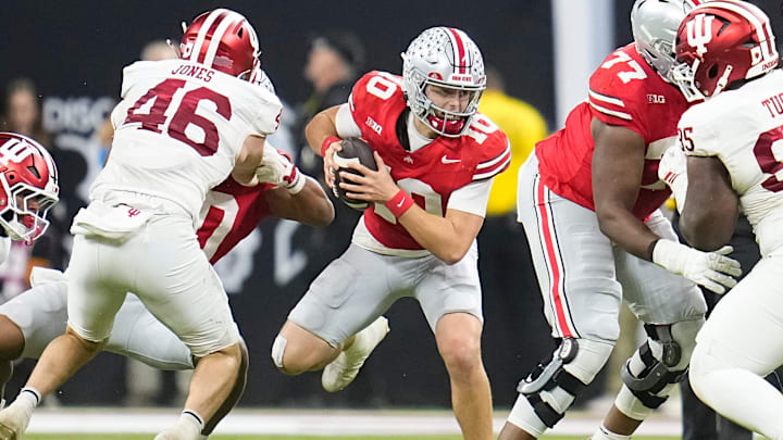Ohio State Buckeyes quarterback Julian Sayin (10) scrambles during the first half of the Big Ten Conference championship game against the Indiana Hoosiers at Lucas Oil Stadium in Indianapolis on Dec. 6, 2025.