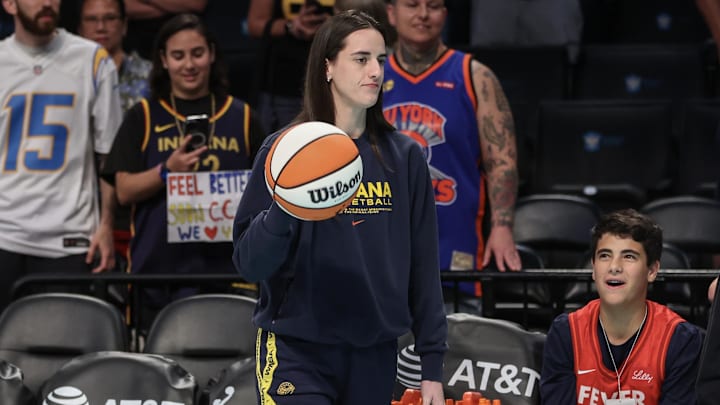 Jul 22, 2025; Brooklyn, New York, USA; Indiana Fever guard Caitlin Clark (22) walks onto the court prior to the game against the New York Liberty at Barclays Center. Mandatory Credit: Wendell Cruz-Imagn Images Jul 22, 2025; Brooklyn, New York, USA; Indiana Fever guard Caitlin Clark (22) walks onto the court prior to the game against the New York Liberty at Barclays Center. Mandatory Credit: Wendell Cruz-Imagn Images