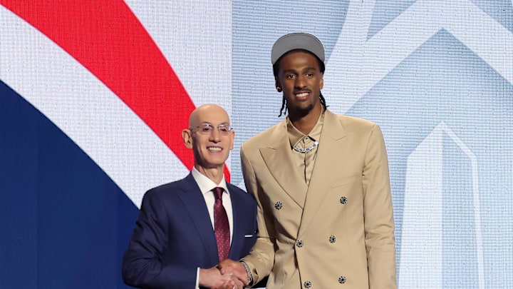 Jun 26, 2024; Brooklyn, NY, USA; Alexandre Sarr poses for photos with NBA commissioner Adam Silver after being selected second overall by the Washington Wizards in the first round in the 2024 NBA Draft at Barclays Center. Mandatory Credit: Brad Penner-Imagn Images