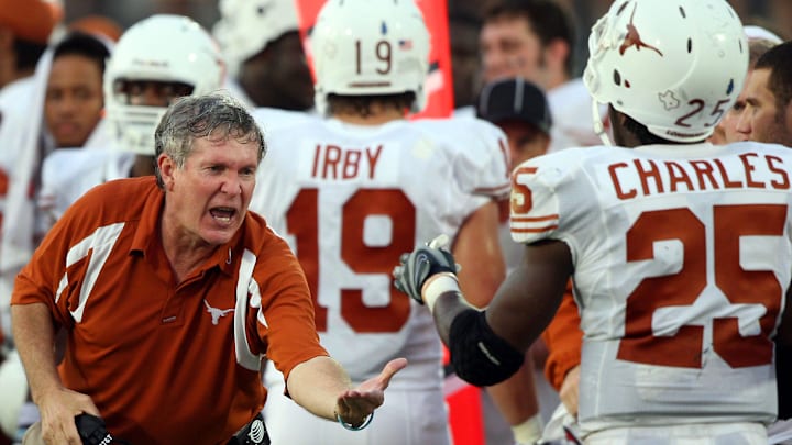 9/8/07 Texas Head Coach Mack Brown gives NO. 25 Jamaal Charles a High five after scoring a touchdown late in the fourth quarter of the game against UCF at Bright House Networks Stadium on Saturday September 15, 2007.