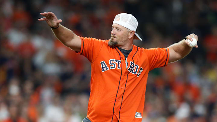 Oct 5, 2019; Houston, TX, USA; Former Astros' Billy Wagner throws out the first pitch prior to the game between the Tampa Bay Rays and the Houston Astros in game two of the 2019 ALDS playoff baseball series at Minute Maid Park. Mandatory Credit: Thomas B. Shea-Imagn Images