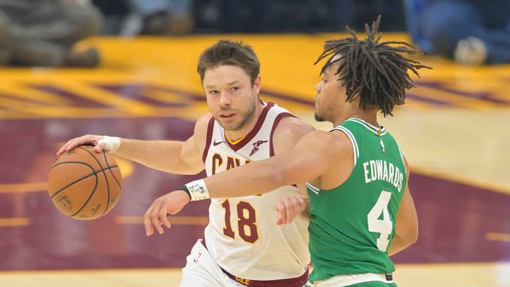 Oct 15, 2019; Cleveland, OH, USA; Cleveland Cavaliers guard Matthew Dellavedova (18) drives against Boston Celtics guard Carsen Edwards (4) in the first quarter at Rocket Mortgage FieldHouse. Mandatory Credit: David Richard-USA TODAY Sports Oct 15, 2019; Cleveland, OH, USA; Cleveland Cavaliers guard Matthew Dellavedova (18) drives against Boston Celtics guard Carsen Edwards (4) in the first quarter at Rocket Mortgage FieldHouse. Mandatory Credit: David Richard-USA TODAY Sports