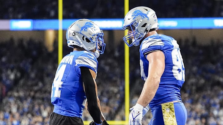 Nov 17, 2024; Detroit, MI, USA; Detroit Lions tight end Brock Wright (89) celebrates a touchdown against Jacksonville Jaguars with wide receiver Amon-Ra St. Brown (14) during the second half at Ford Field in Detroit on Sunday, Nov. 17, 2024. Mandatory Credit: Junfu Han/USA TODAY Network via Imagn Images 