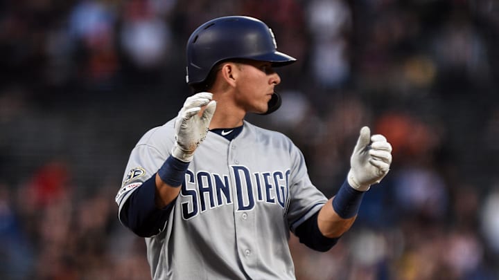 Aug 29, 2019; San Francisco, CA, USA; San Diego Padres infielder Luis Urias (9) reacts on third base after hitting a triple against the San Francisco Giants in the fourth inning at Oracle Park. Mandatory Credit: Cody Glenn-Imagn Images