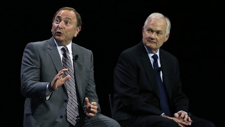 Sep 9, 2015; Toronto, Ontario, Canada; NHL commissioner Gary Bettman and NHLPA executive director Donald Fehr appear on stage together during a press conference and media event for the 2016 World Cup of Hockey at Air Canada Centre. Mandatory Credit: Tom Szczerbowski-Imagn Images
