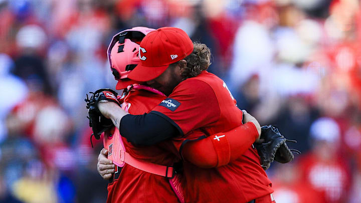 May 9, 2026; Cincinnati, Ohio, USA; Cincinnati Reds relief pitcher Pierce Johnson (52) hugs catcher Jose Trevino (35) after the victory over the Houston Astros at Great American Ball Park. Mandatory Credit: Katie Stratman-Imagn Images