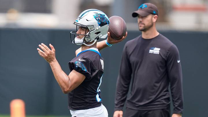 Carolina Panthers quarterback Bryce Young (9) throws in front of head coach Dave Canales during the first day of mini camp Carolina Panthers quarterback Bryce Young (9) throws in front of head coach Dave Canales during the first day of mini camp