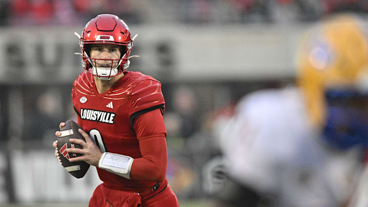Nov 23, 2024; Louisville, Kentucky, USA; Louisville Cardinals quarterback Tyler Shough (9) looks to pass against the Pittsburgh Panthers during the first half at L&N Federal Credit Union Stadium.