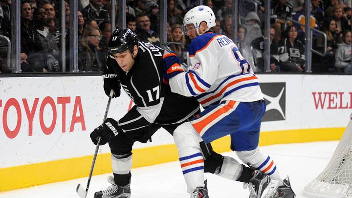 November 14, 2015; Los Angeles, CA, USA; Los Angeles Kings left wing Milan Lucic (17) plays for the puck against Edmonton Oilers defenseman Griffin Reinhart (8) in the second period at Staples Center. Mandatory Credit: Gary A. Vasquez-Imagn Images November 14, 2015; Los Angeles, CA, USA; Los Angeles Kings left wing Milan Lucic (17) plays for the puck against Edmonton Oilers defenseman Griffin Reinhart (8) in the second period at Staples Center. Mandatory Credit: Gary A. Vasquez-Imagn Images