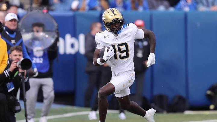 Nov 29, 2025; Provo, Utah, USA; UCF Knights wide receiver Waden Charles (19) runs after a catch against the BYU Cougars during the second half at LaVell Edwards Stadium. Mandatory Credit: Rob Gray-Imagn Images Nov 29, 2025; Provo, Utah, USA; UCF Knights wide receiver Waden Charles (19) runs after a catch against the BYU Cougars during the second half at LaVell Edwards Stadium. Mandatory Credit: Rob Gray-Imagn Images