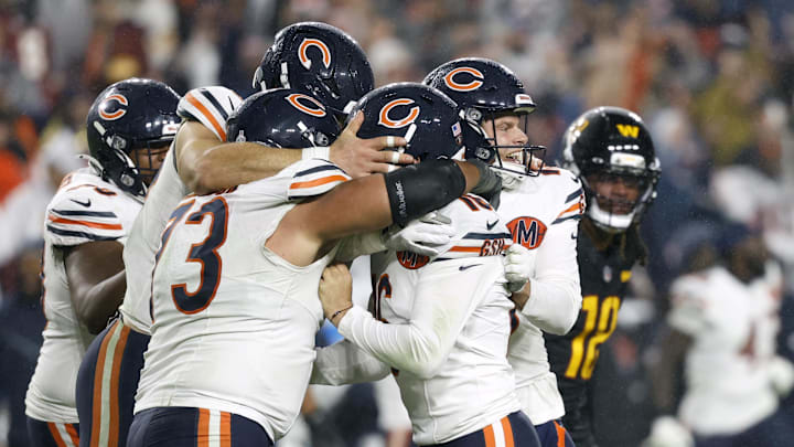 Oct 13, 2025; Landover, Maryland, USA; Chicago Bears kicker Jake Moody (16) celebrates with teammates after kicking a game-winning field goal against the Washington Commanders during the fourth quarter at Northwest Stadium. Mandatory Credit: Geoff Burke-Imagn Images