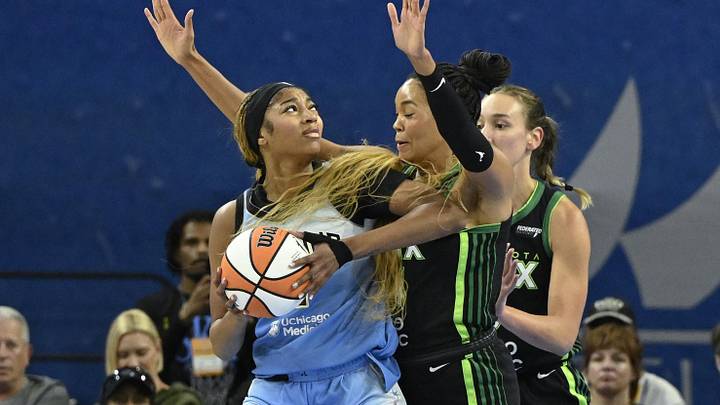 Jul 14, 2025; Chicago, Illinois, USA;  Chicago Sky forward Angel Reese (5) drives to the basket against Minnesota Lynx forward Alanna Smith (8) and forward Napheesa Collier (24)  defends against Minnesota Lynx forward Jessica Shepard (15) during the first half at Wintrust Arena. Mandatory Credit: Matt Marton-Imagn Images