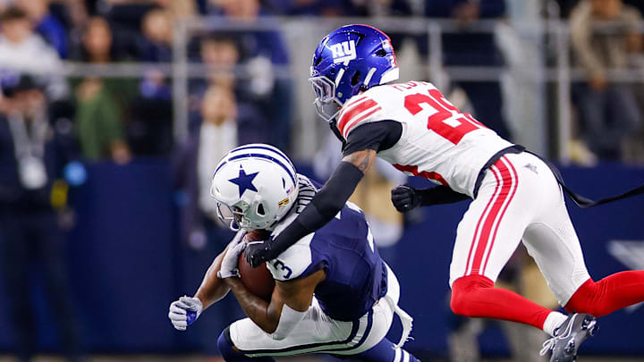 Nov 28, 2024; Arlington, Texas, USA; Dallas Cowboys wide receiver Brandin Cooks (3) makes a catch with New York Giants cornerback Cor'Dale Flott (28) defending at AT&T Stadium. Mandatory Credit: Andrew Dieb-Imagn Images