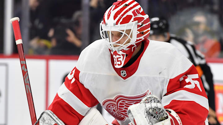 Detroit Red Wings goaltender Ville Husso (35) sets up in the crease.