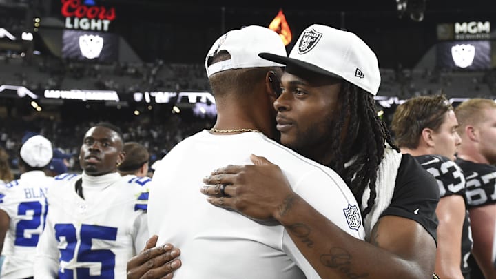 Aug 17, 2024; Paradise, Nevada, USA; Dallas Cowboys quarterback Dak Prescott (4) hugs Las Vegas Raiders wide receiver Davante Adams (17) postgame at Allegiant Stadium. Mandatory Credit: Candice Ward-Imagn Images Aug 17, 2024; Paradise, Nevada, USA; Dallas Cowboys quarterback Dak Prescott (4) hugs Las Vegas Raiders wide receiver Davante Adams (17) postgame at Allegiant Stadium. Mandatory Credit: Candice Ward-Imagn Images