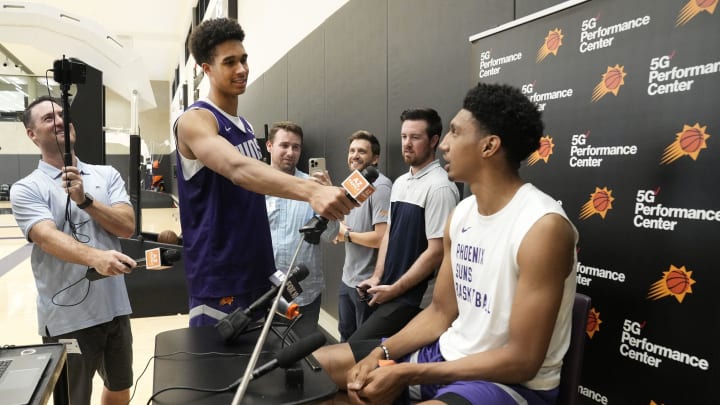 Forward Oso Ighodaro interviews forward Ryan Dunn during the Suns Summer League at Verizon 5G Performance Center on July 9, 2024, in Phoenix. Forward Oso Ighodaro interviews forward Ryan Dunn during the Suns Summer League at Verizon 5G Performance Center on July 9, 2024, in Phoenix.
